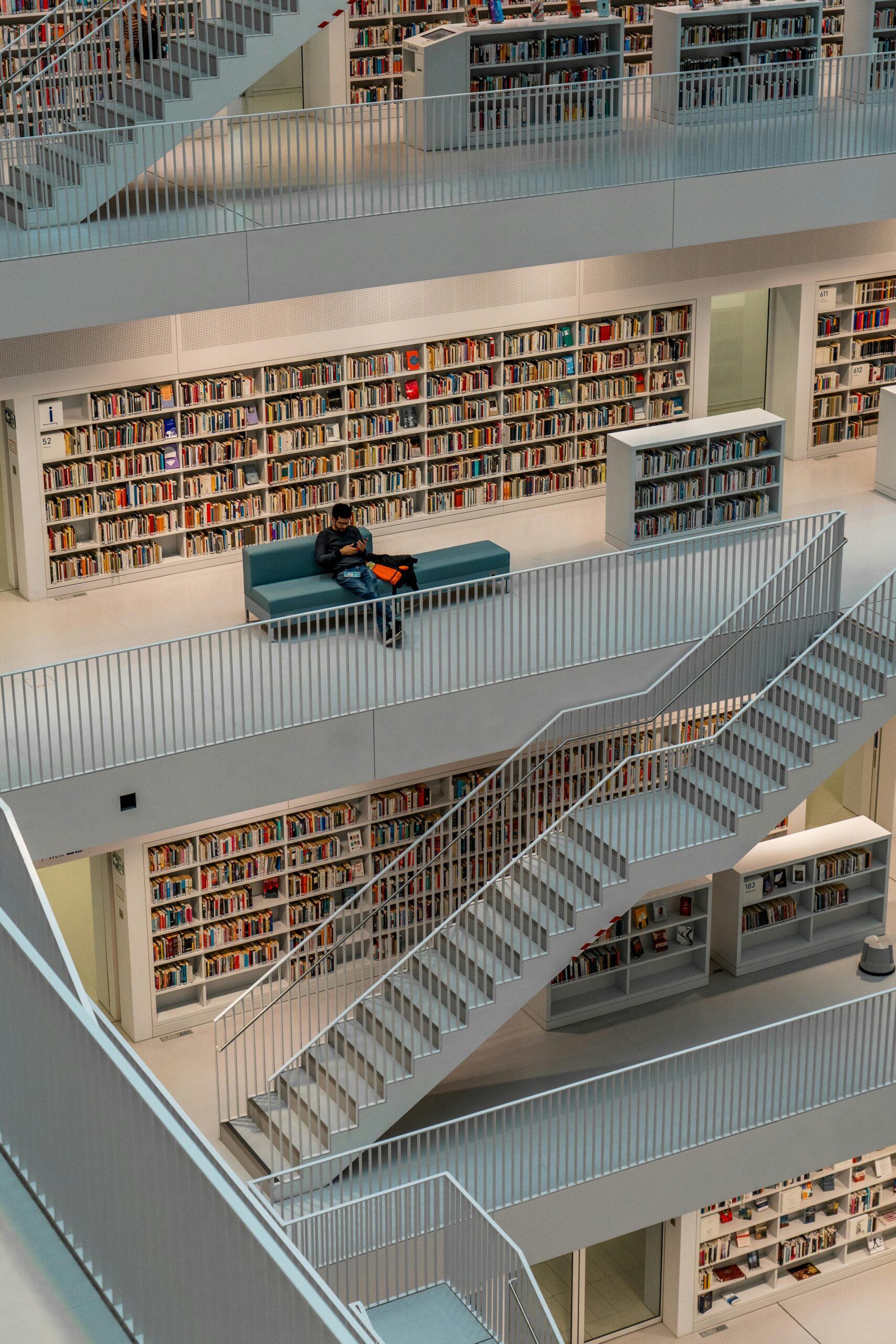 Explore the sleek architecture of a modern library's interior in Stuttgart, Germany.